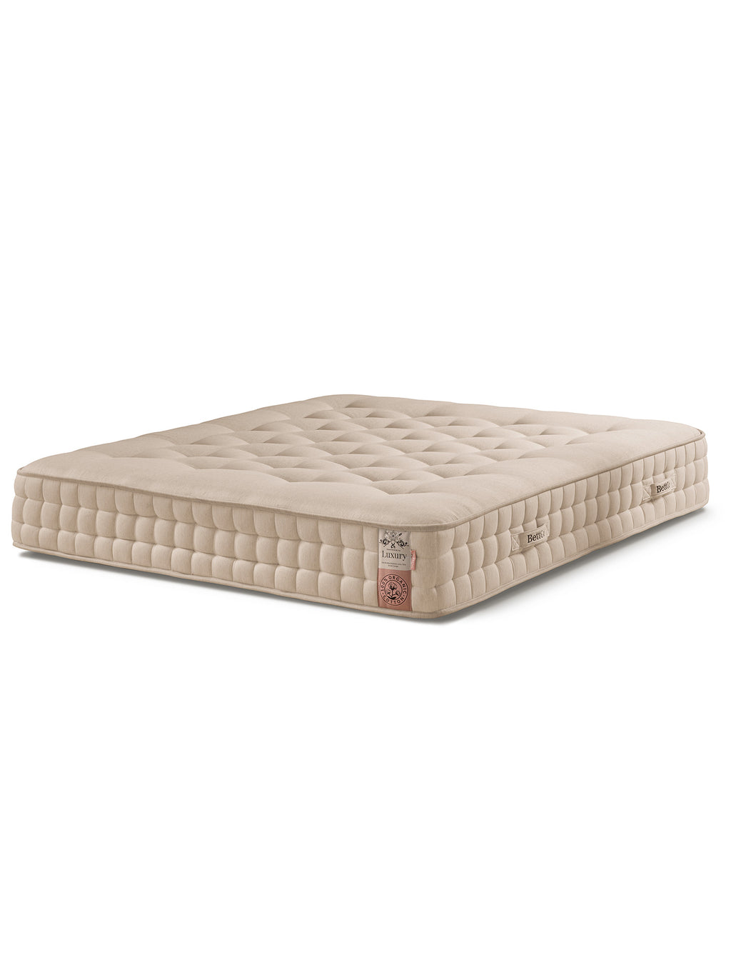 Beige Matratze mit quadratischem Steppmuster und Etiketten an der Seite.