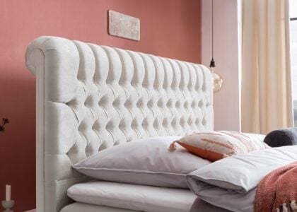 Kopfteil vom Boxspringbett Chester mit Bettkasten in Samt Creme