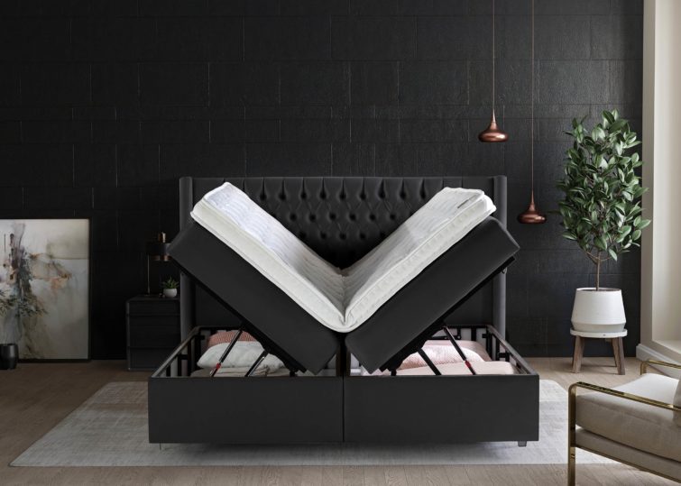 Boxspringbett Florida mit geöffneten Bettkasten in Velour Schwarz
