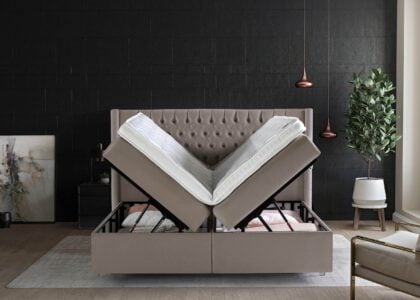 Boxspringbett Florida mit geöffneten Bettkasten in Velour Taupe