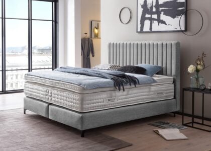 Boxspringbett Paris modernes Kopfteil mit vertikalen Linien in Webstoff Hellgrau